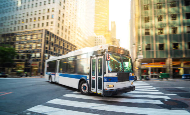 Photo of a bus turning on a street in New York City